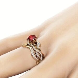 Elegant Gold and Red Gemstone Ring Set.